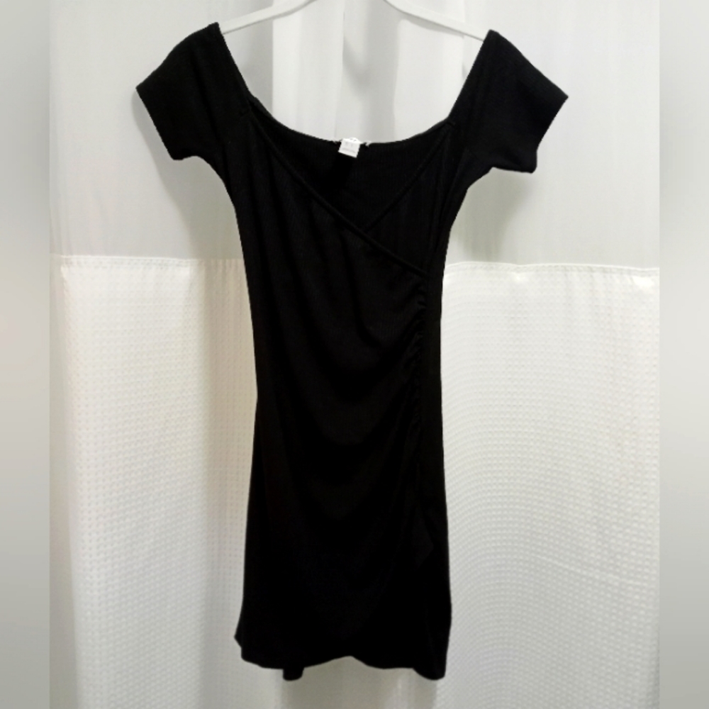 EUC. Black mini dress with crossover front and ruching on side. Size small.
